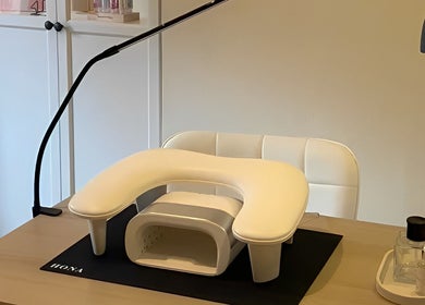 Nail station at Rosie’s Retreat, Barton-under-Needwood, England. Modern setup with tools and sleek design.