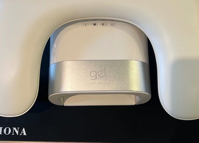 Gel lamp setup at Rosie’s Retreat, Barton-under-needwood, England, GB, enhancing nail beauty.