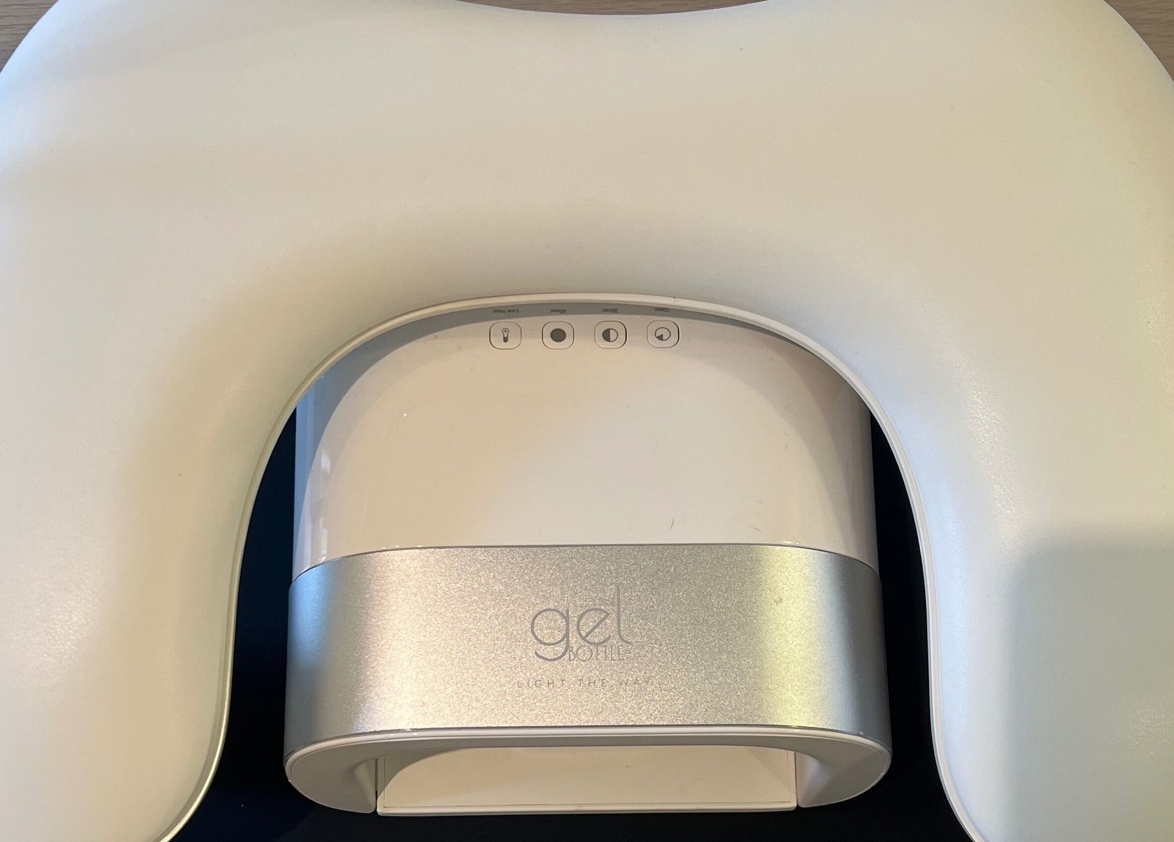 Modern gel nail lamp at Rosie’s Retreat, Barton-under-Needwood, England, GB, enhancing manicure experience.
