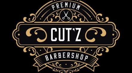 Cut'z Barbershop Cornubia logo in Mount Edgecombe, Kwazulu-natal, ZA, showcasing ornate design.