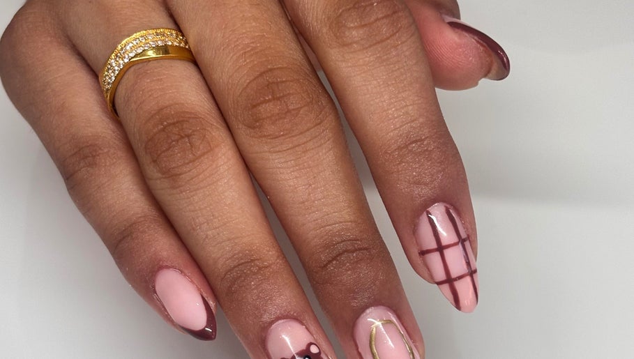 Elegant nail art on manicured hand at NAIL’D IT by khushi in Leicester, England, GB.