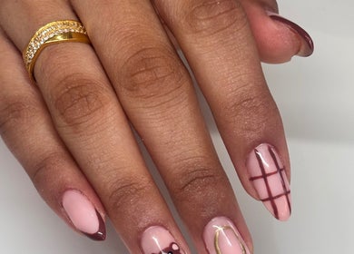 Elegant nail art on manicured hand at NAIL’D IT by khushi in Leicester, England, GB.