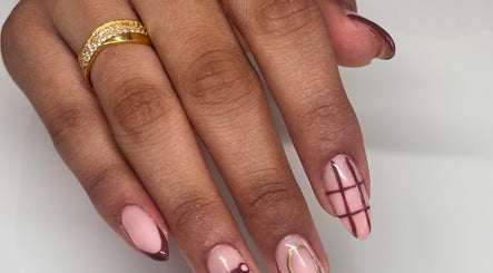 Elegant nail art on manicured hand at NAIL’D IT by khushi in Leicester, England, GB.