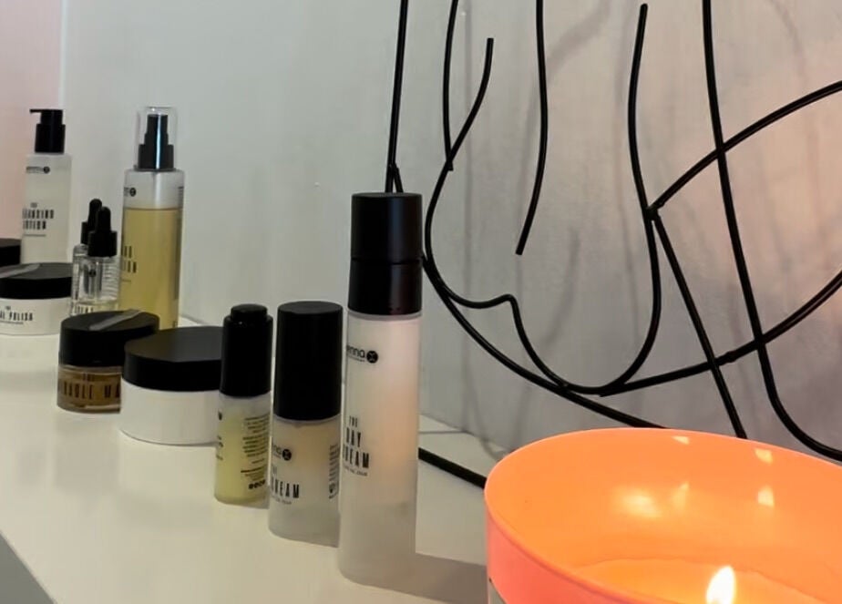 Stylish beauty products and a candle at Emma Beth Make-Up, Nerja, Andalucía, ES.
