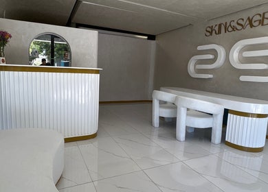 Elegant reception area at Skin & Sage, Cape Town, Western Cape, ZA, featuring modern decor and soothing ambiance.
