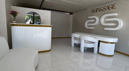 Elegant reception area at Skin & Sage, Cape Town, Western Cape, ZA, featuring modern decor and soothing ambiance.
