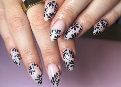 Elegant floral nail design by Nails by Maddy in Truro, England, GB. Perfect for style enthusiasts.