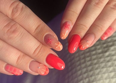 Stylish coral nail art with starfish at Nails by Maddy, Truro, England, GB.