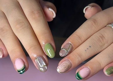 Chic nail art featuring green and pink designs at Nails by Maddy, Truro, England, GB for stylish looks.