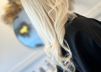 Elegant blonde waves styled at Opal & Mane in Sunderland, England, GB, reflecting modern beauty trends.