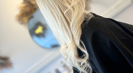 Elegant blonde waves styled at Opal & Mane in Sunderland, England, GB, reflecting modern beauty trends.