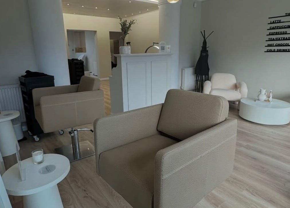 Elegant waiting area at Sadies Luxe Locks, Normanton, England, GB with modern chairs and decor.