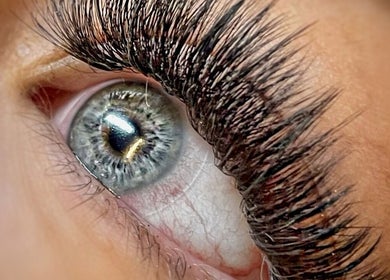 Close-up of an eye with voluminous lashes at Winkology Lash Lab, Sugar Hill, Georgia, US.