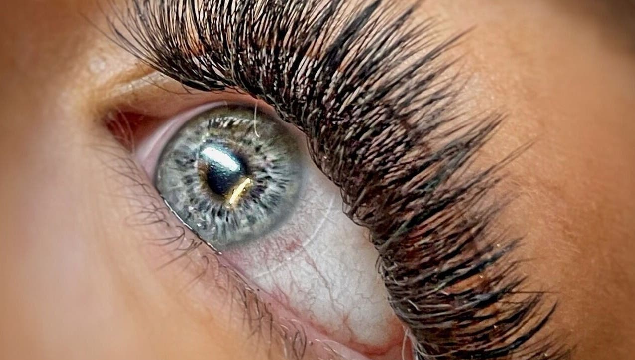 Close-up of eyelash extensions at Winkology Lash Lab in Sugar Hill, Georgia, US, showcasing detailed lash artistry.