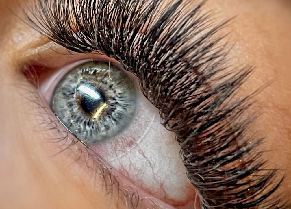 Close-up of eyelash extensions at Winkology Lash Lab in Sugar Hill, Georgia, US, showcasing detailed lash artistry.