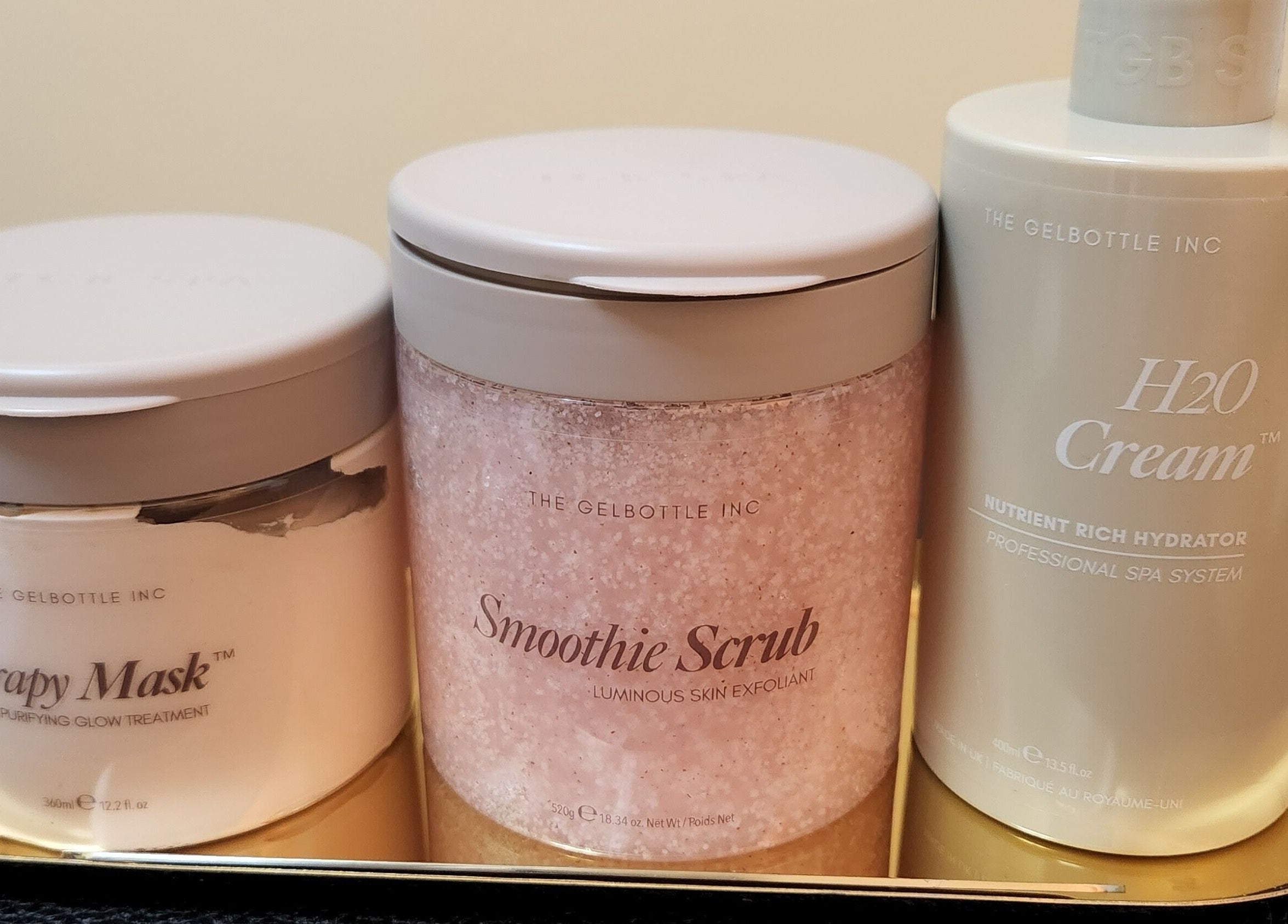 Luxurious skincare products at Netty's Nail Studio, Pocatello, Idaho, US, featuring scrub, mask, and cream.