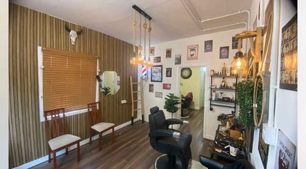 Interior of Gents hairdresser in Cork, County Cork, IE, featuring stylish chairs and vintage decor.