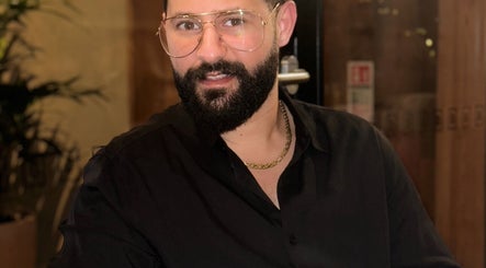 A stylish gentleman at Gents Hairdresser, Cork, County Cork, IE, showcasing expert grooming.