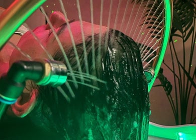 Revitalizing hair wash at Beauty Space, Glasgow, Scotland, GB with soothing water jets.