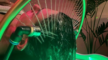 Revitalizing hair wash at Beauty Space, Glasgow, Scotland, GB with soothing water jets.