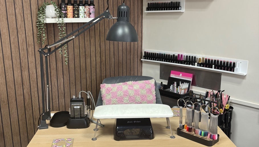 Elegant nail station at The Nail Hut - By Alison in Sheffield, England, GB, featuring a variety of nail polish.