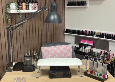 Elegant nail station at The Nail Hut - By Alison in Sheffield, England, GB, featuring a variety of nail polish.