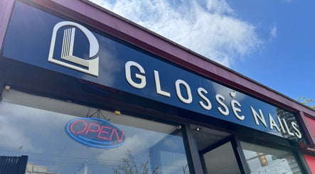 Entrance of Glossé Nails in Vancouver, British Columbia, CA with open sign and logo.