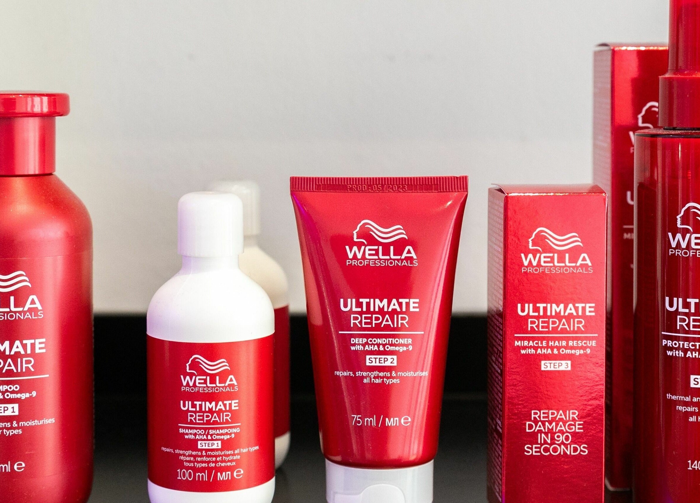 A range of Wella repair products displayed at Divas Hair, Cheshunt, England, GB.