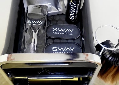 Professional hair tools organized at BeyondLengthEssex, Dunmow, England, GB.