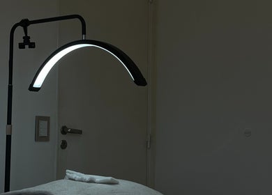 Modern therapy lamp in treatment room at Nava Estudio, Buenos Aires, Ciudad Autónoma De Buenos Aires, AR.