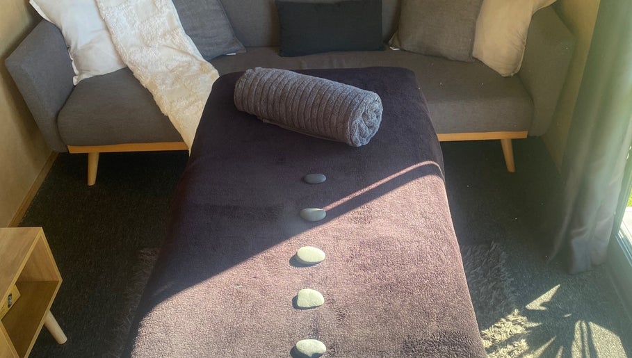 Relaxing massage bed with stones at Mirimiri Mai Rā, Rotorua, Bay Of Plenty Region, NZ.