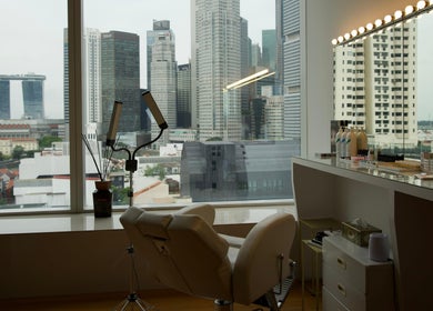 Relaxing spa chair at GERGERT BEAUTY PTE LTD, overlooking Singapore skyline, Singapore, SG.