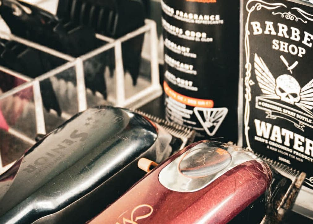 Close-up of barber tools at The Vigilante Barber, Erakala, Queensland, AU. Clippers and grooming products.