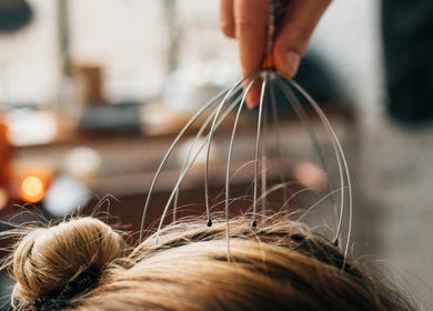 Relaxation therapy at Goosebumpz, Bali, Bali, ID using a head massager. Experience ultimate tranquility.