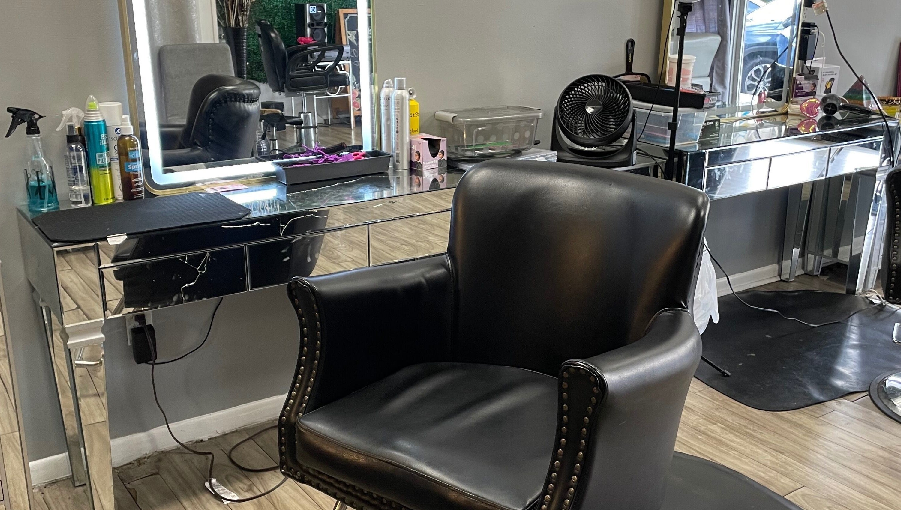 Sleek salon chair at Kay’s Kraft in Lithonia, Georgia, US, showcasing modern beauty space.