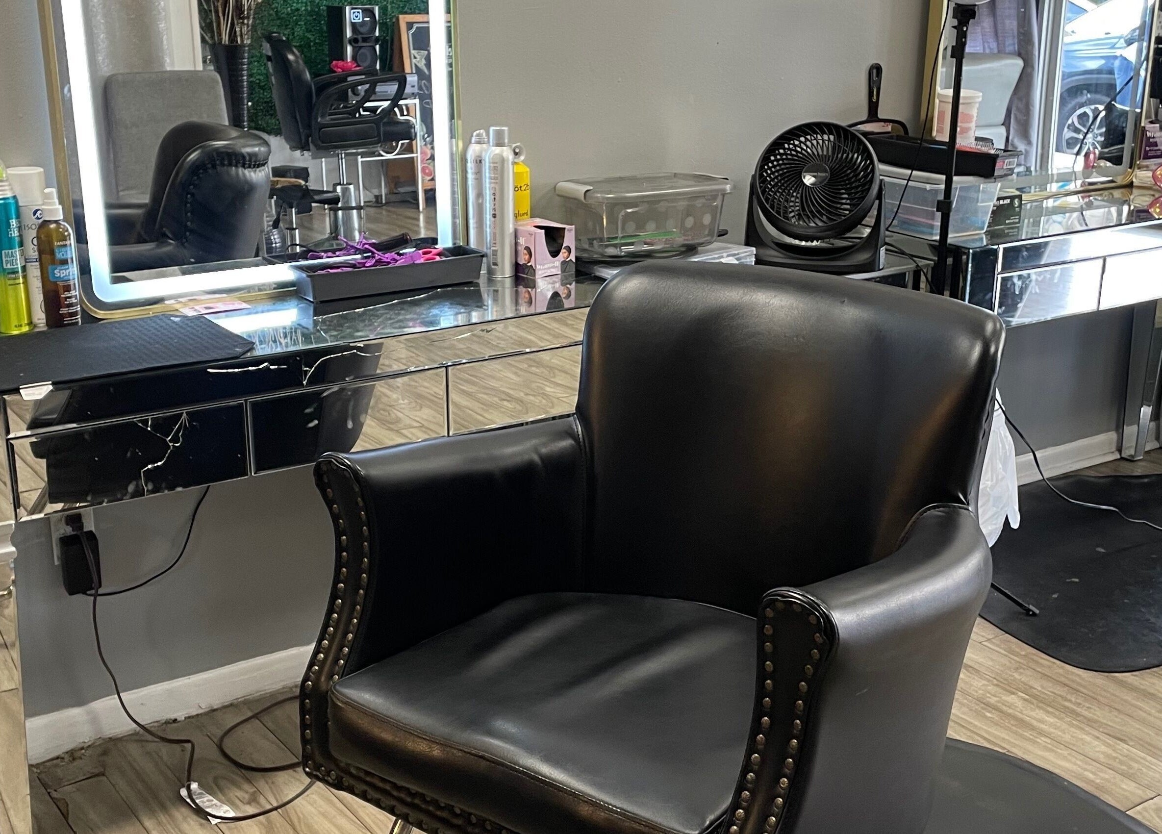 Sleek salon chair at Kay’s Kraft in Lithonia, Georgia, US, showcasing modern beauty space.