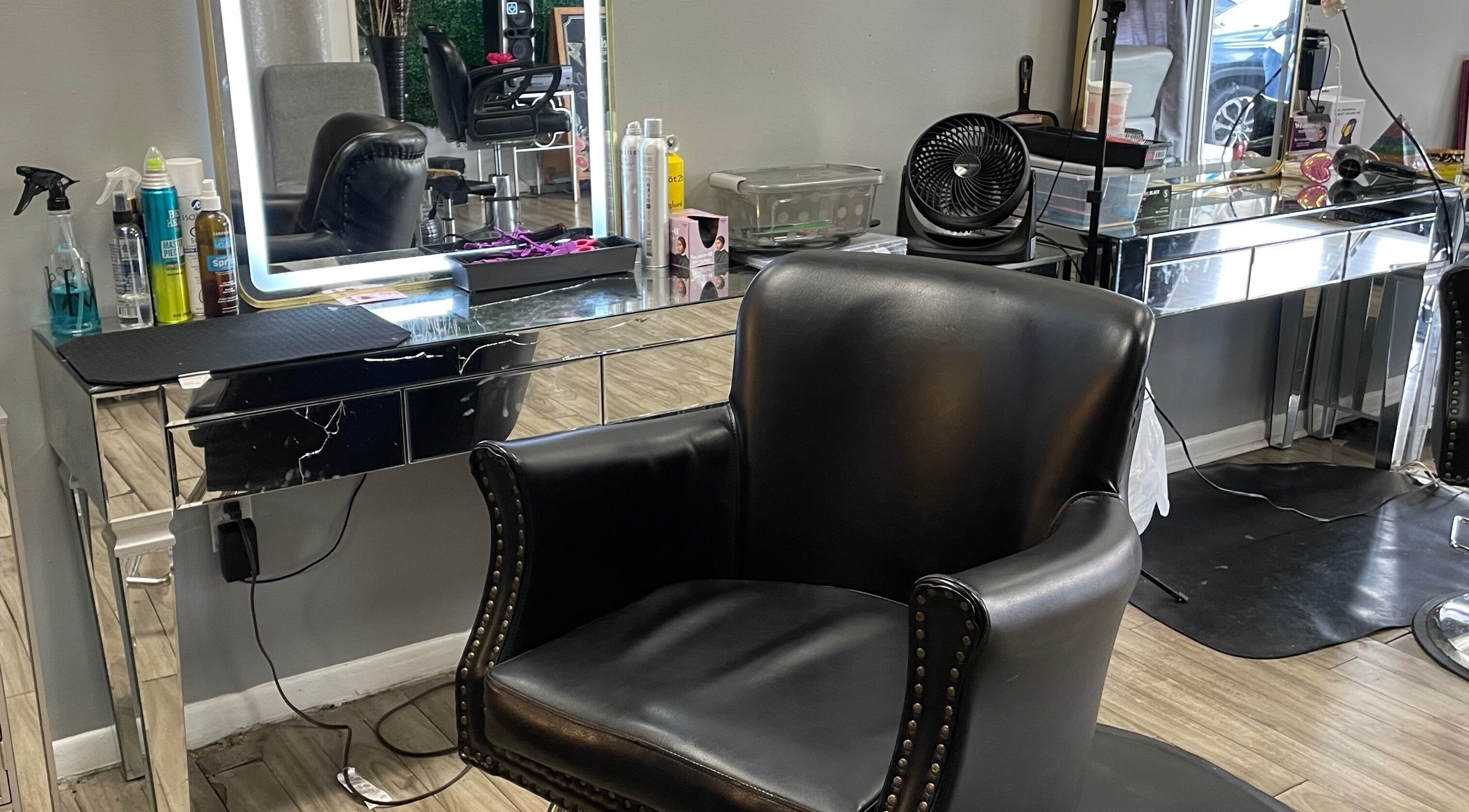 Sleek salon chair at Kay’s Kraft in Lithonia, Georgia, US, showcasing modern beauty space.