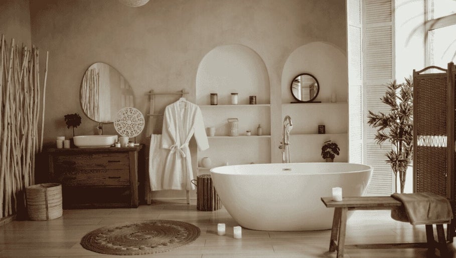 Luxurious spa room at ELILA Spa & Retreat, Kuala Lumpur, featuring a soaking tub and natural decor.