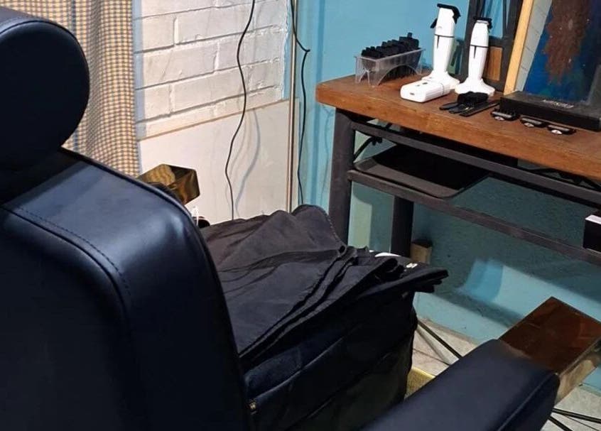 Silla de barbero en Barbería Punto de Encuentro, Quilicura, Región Metropolitana, CL. Espacio acogedor y moderno.