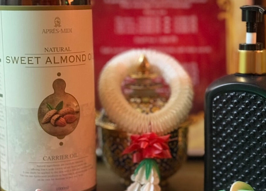 Natural sweet almond oil display at Jasmine Thaispa, Shinjuku City, Tokyo, JP, enhancing spa ambiance.