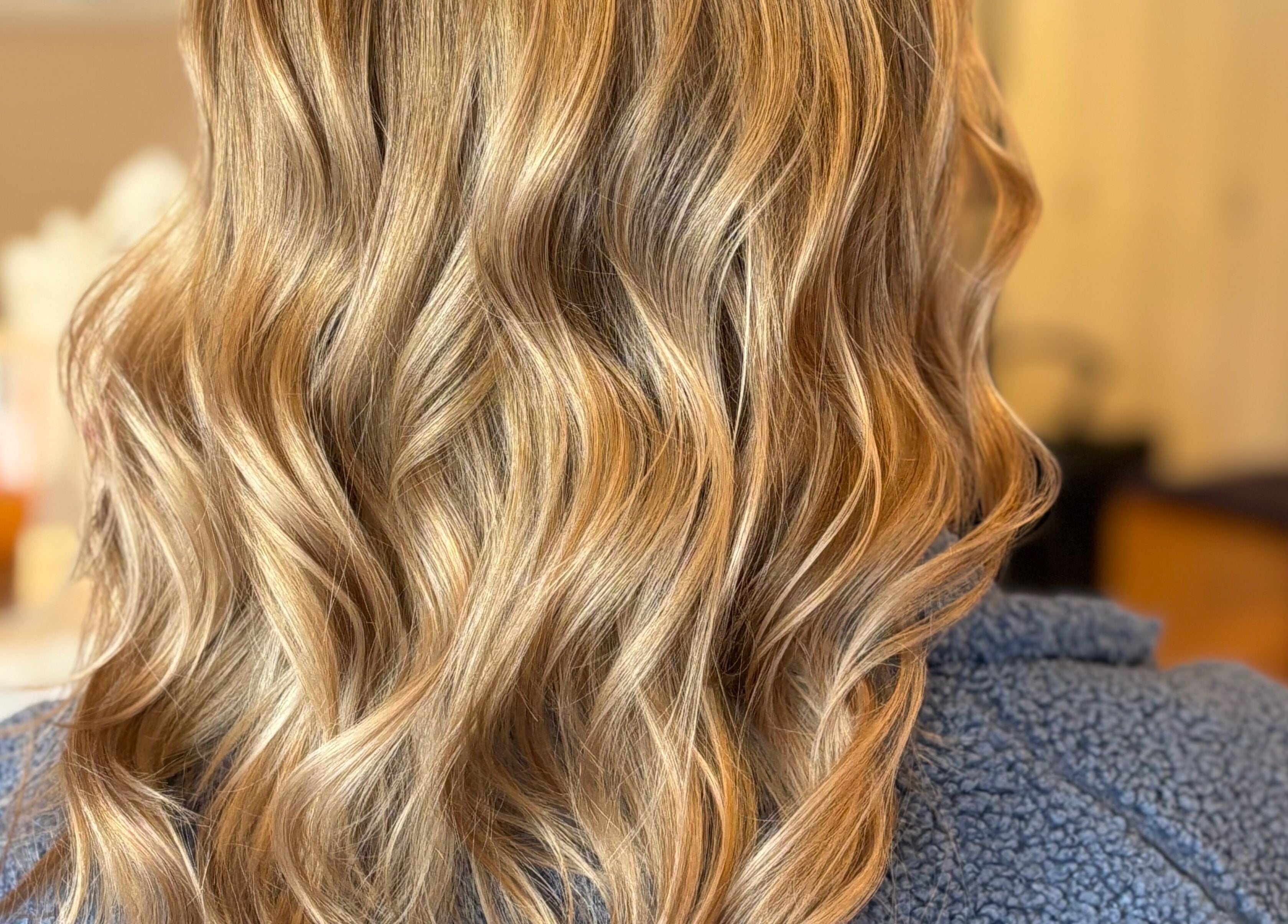 Elegant golden waves hairstyle at Freya Beauty Salon, Derry, New Hampshire, US.