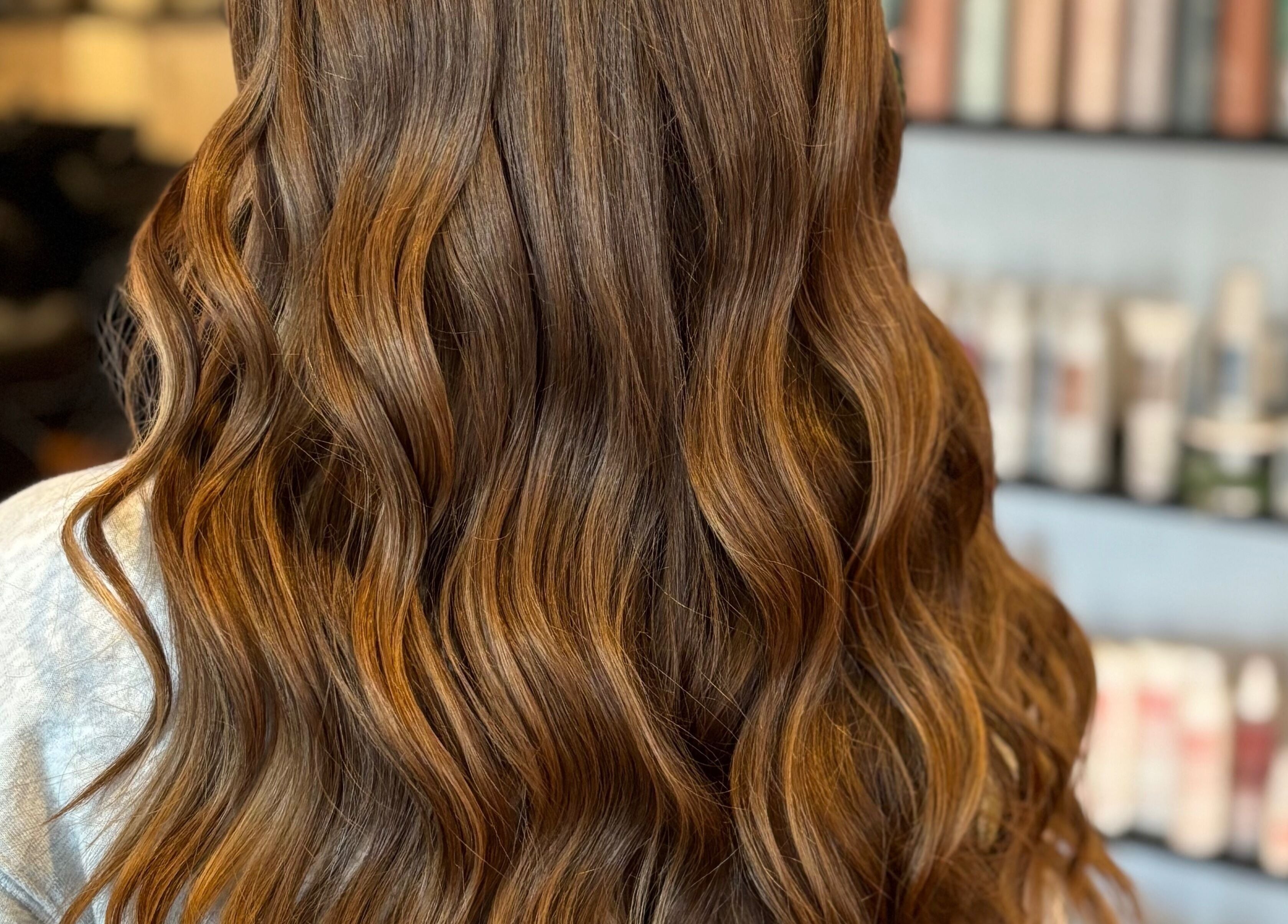 Luscious wavy hair styled at Freya Beauty Salon in Derry, New Hampshire, US.