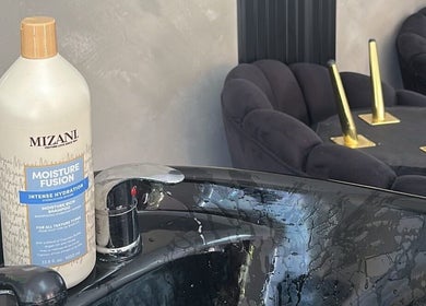 A stylish hair wash station with Mizani shampoo at Zoteya Beauty Salon, Sandton, Gauteng, ZA.