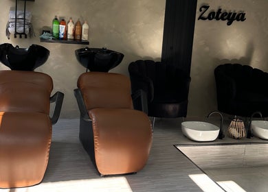 Luxurious chairs at Zoteya Beauty Salon, Sandton, Gauteng, ZA, offering a premium salon experience.