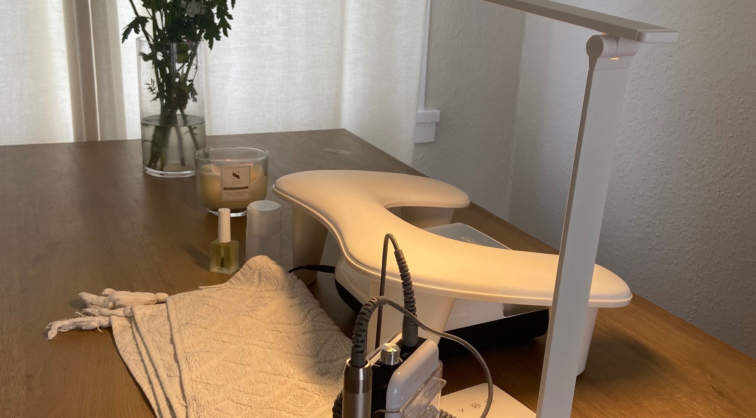 Elegantly arranged nail station at Painted by Meg, Helensburgh, Scotland, GB with tools and calming decor.