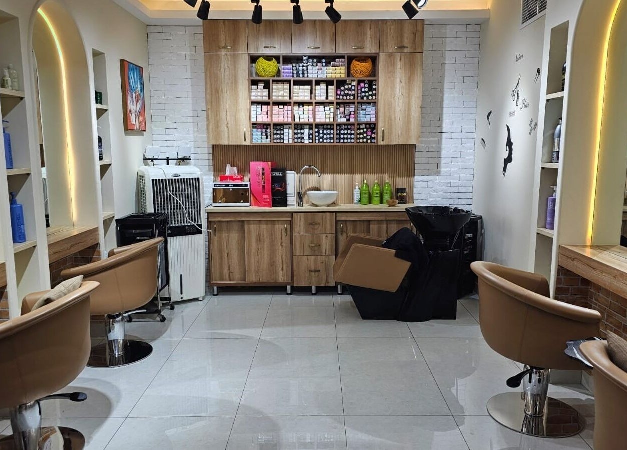 Stylish interior of Bloomself Beauty Ladies Saloon in Abu Dhabi, AE with modern furnishings and beauty products.