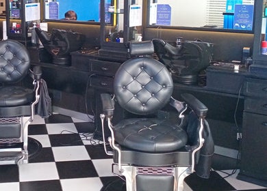 Elegant barber chairs at St Tropez Homme Barbershop, Cape Town, Western Cape, ZA.