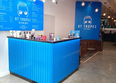 Interior of St Tropez Homme Barbershop showcasing a modern reception in Cape Town, Western Cape, ZA.
