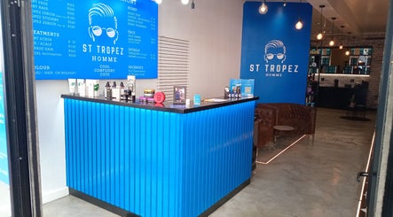 Interior of St Tropez Homme Barbershop showcasing a modern reception in Cape Town, Western Cape, ZA.