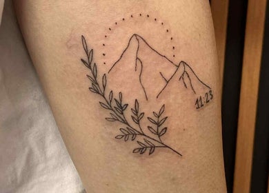 Elegant mountain tattoo at Indecisive Create, Auckland, Auckland, NZ. Perfect for nature enthusiasts.